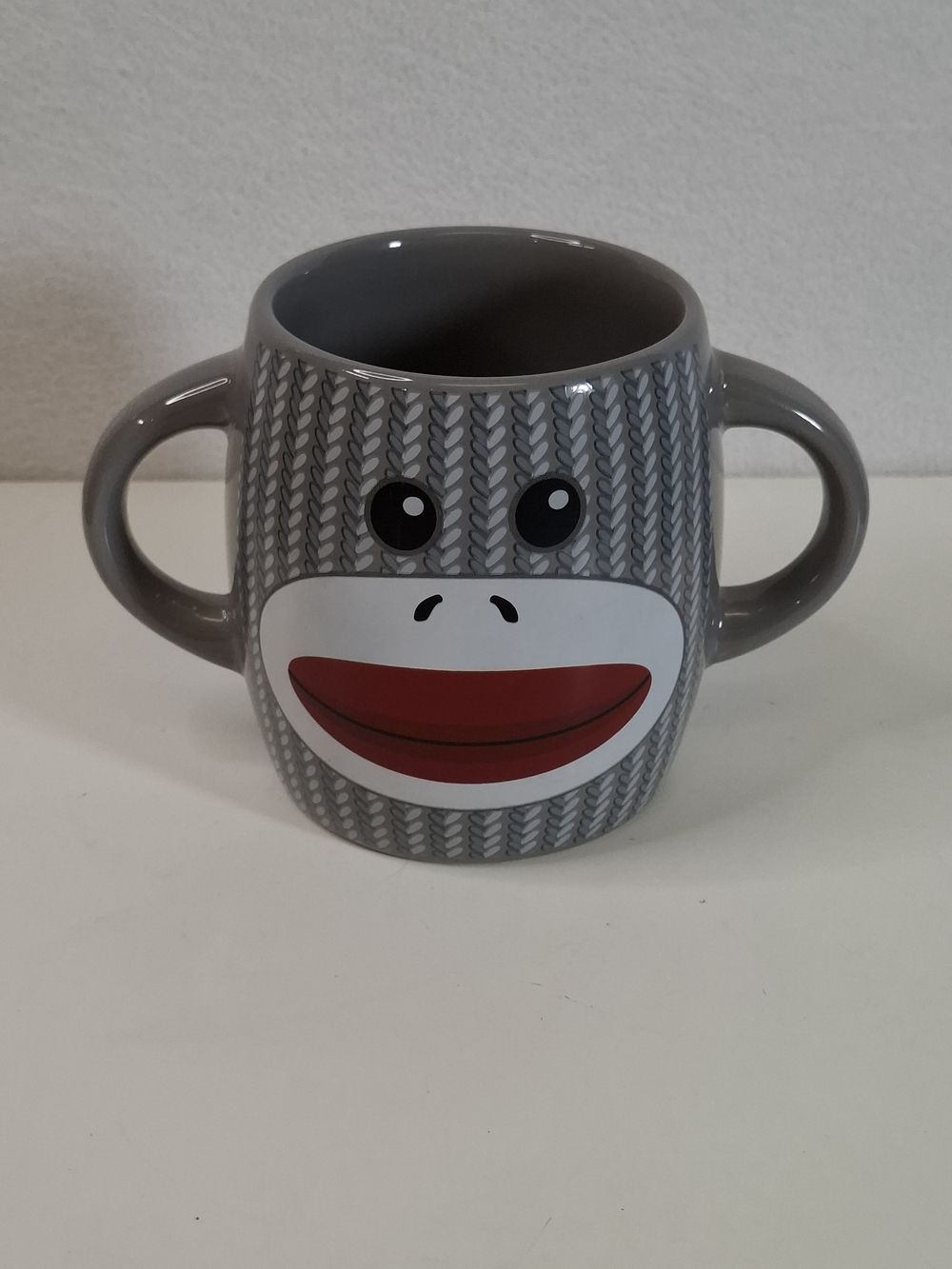 Gray Double-Handled Sock Monkey Ceramic Mug with Playful Face